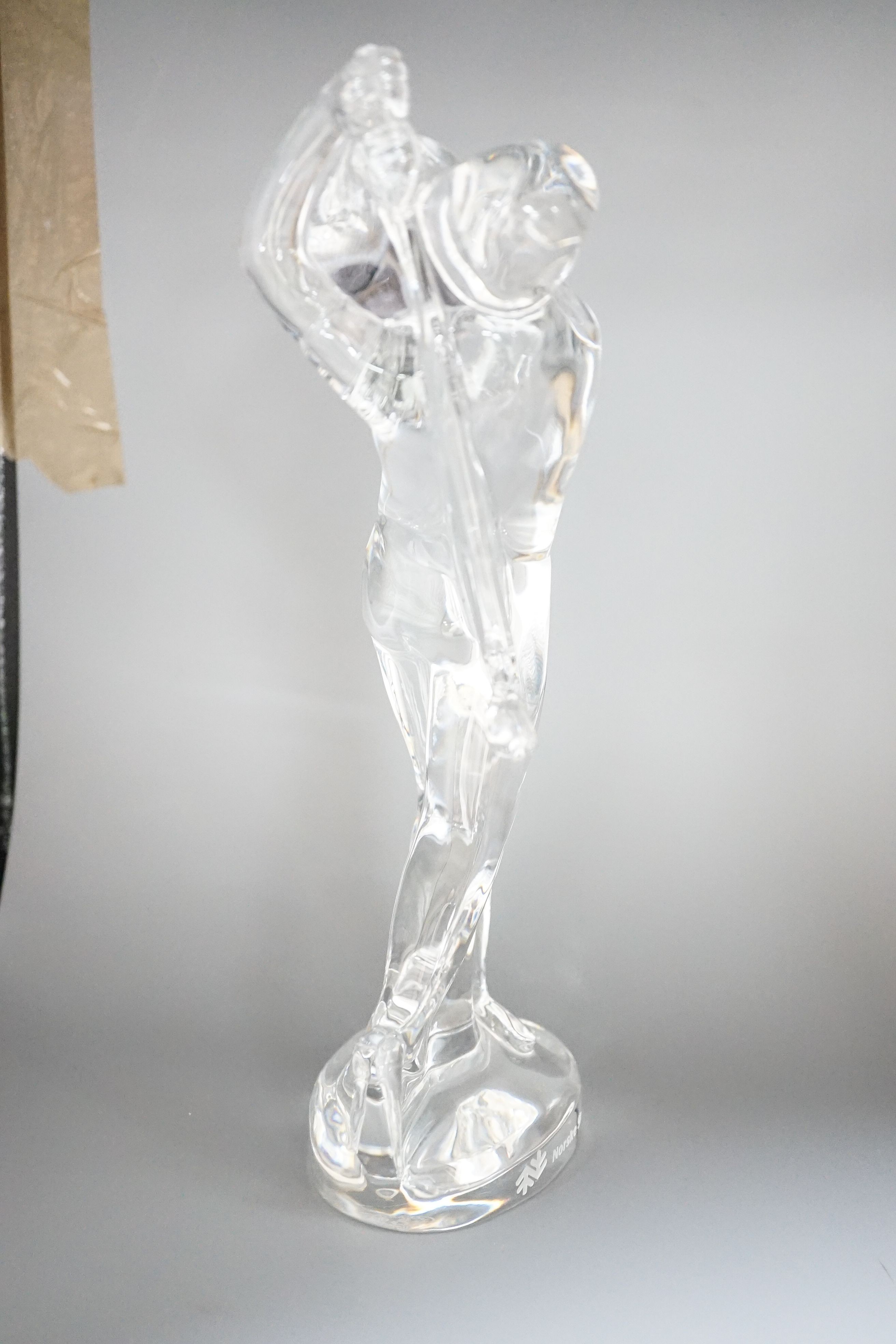 A Baccarat crystal model of a golfer ‘Norske Skog’ to base 24cm